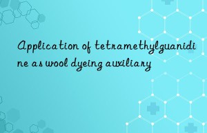 Application of tetramethylguanidine as wool dyeing auxiliary